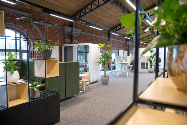 Office equipment with phonebooth, standing workstation, and benches