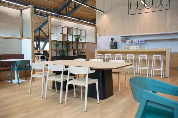 Coffee corner with wooden bar and bar stools