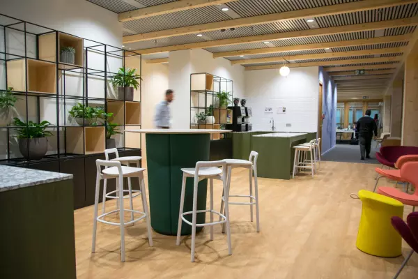 Coffee corner with high table and bar stools